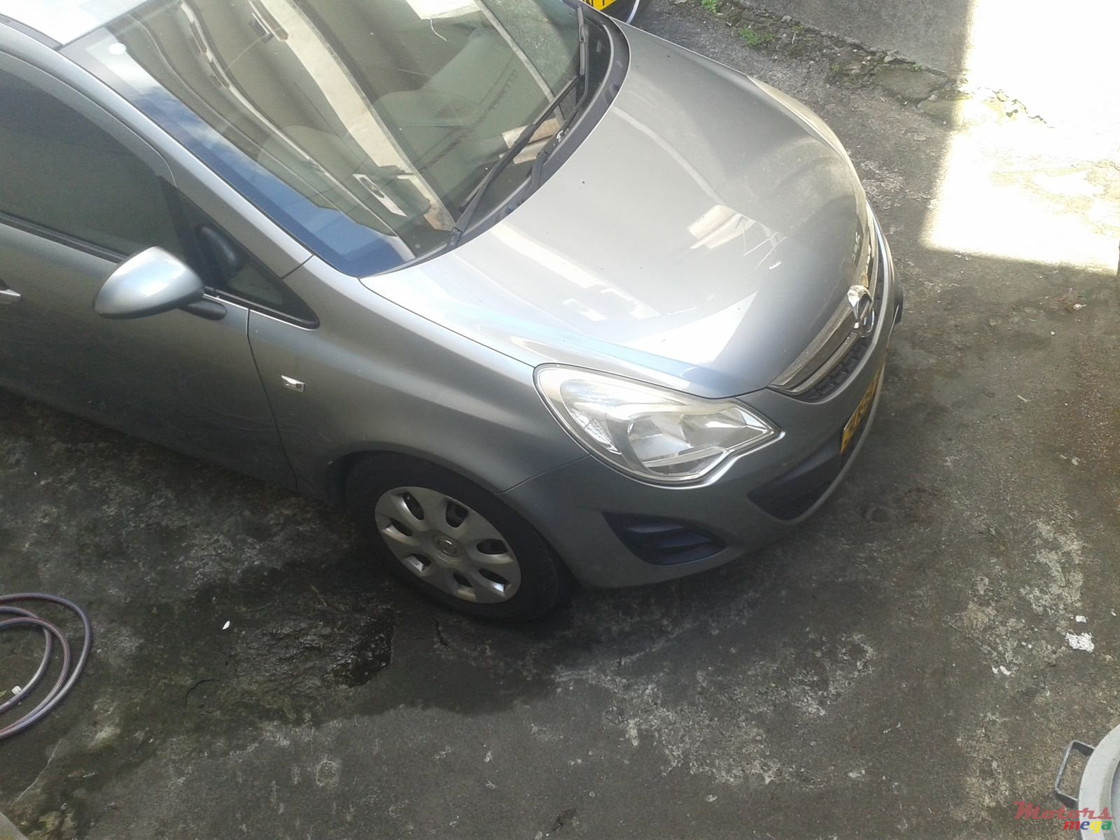 2014' Opel Corsa photo #1