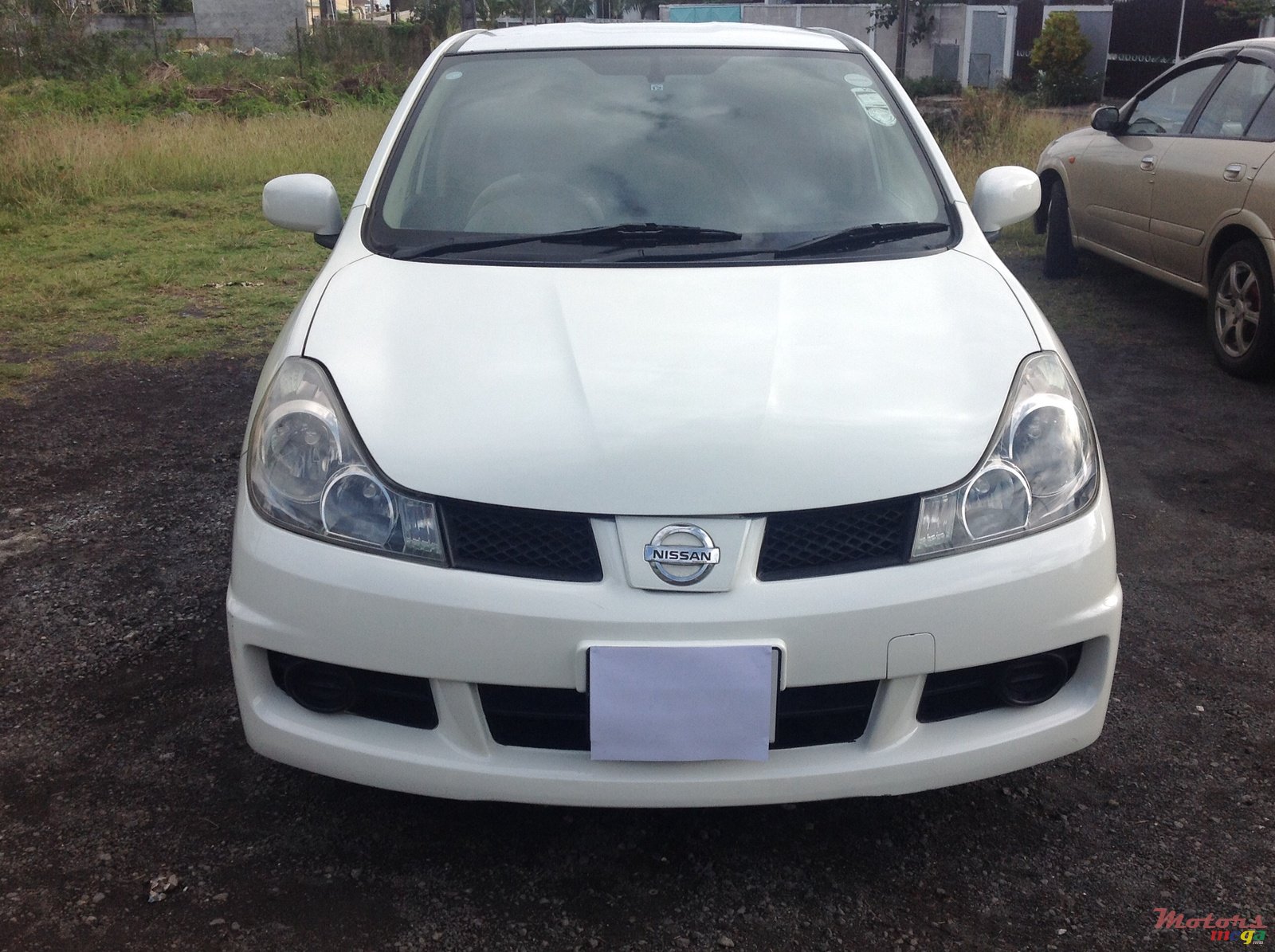 2005' Nissan Wingroad photo #1