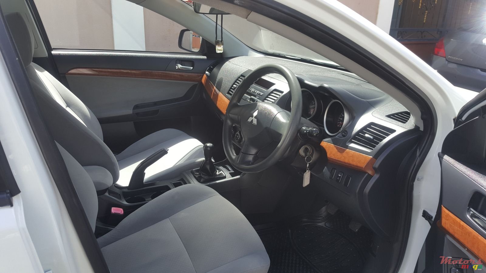 2012' Mitsubishi Lancer Ex photo #7