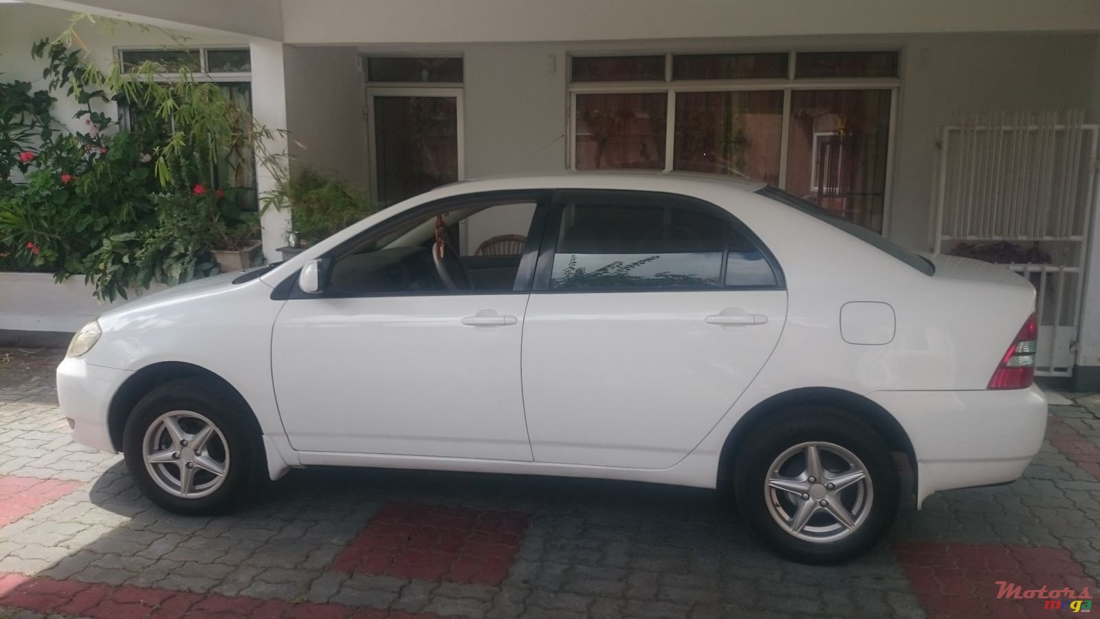 2003' Toyota Corolla NZE photo #3