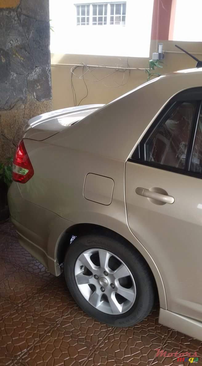 2012' Nissan Tiida photo #6
