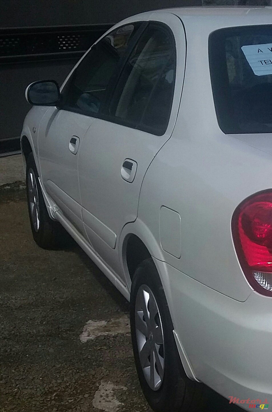 2011' Nissan Original photo #1