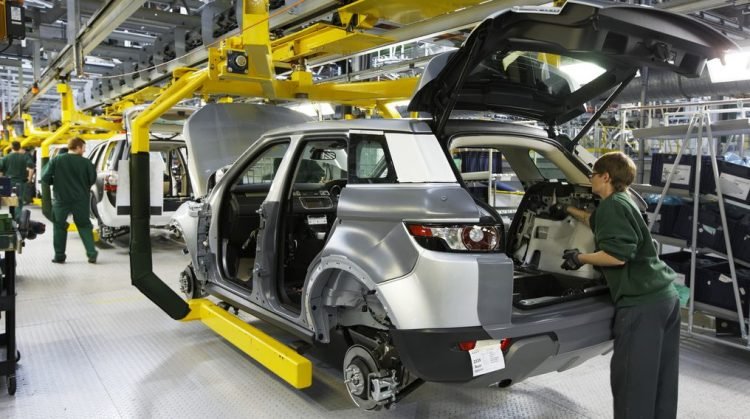 Jaguar Land Rover to cut production at two plants