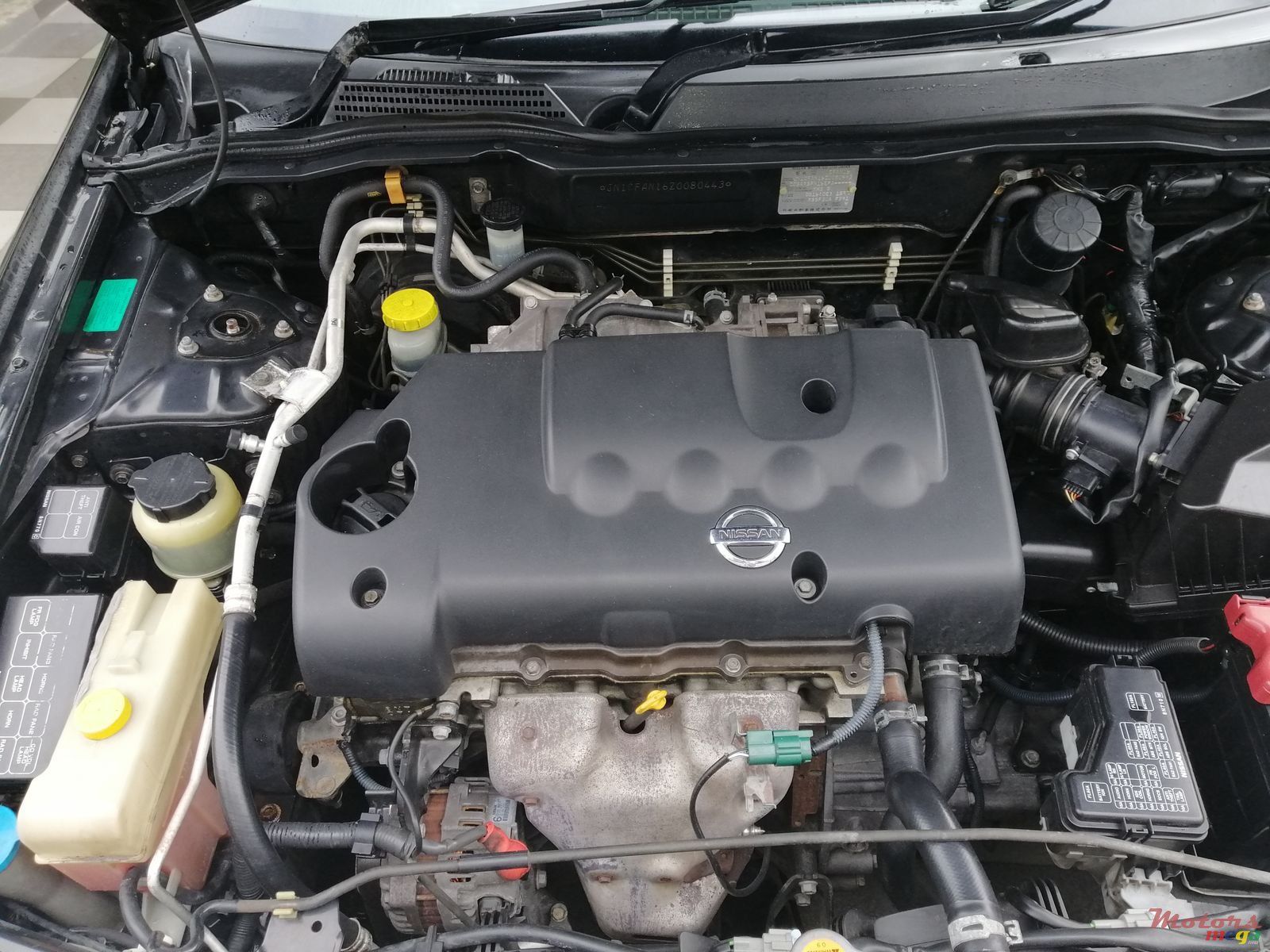 2004' Nissan Sunny photo #2