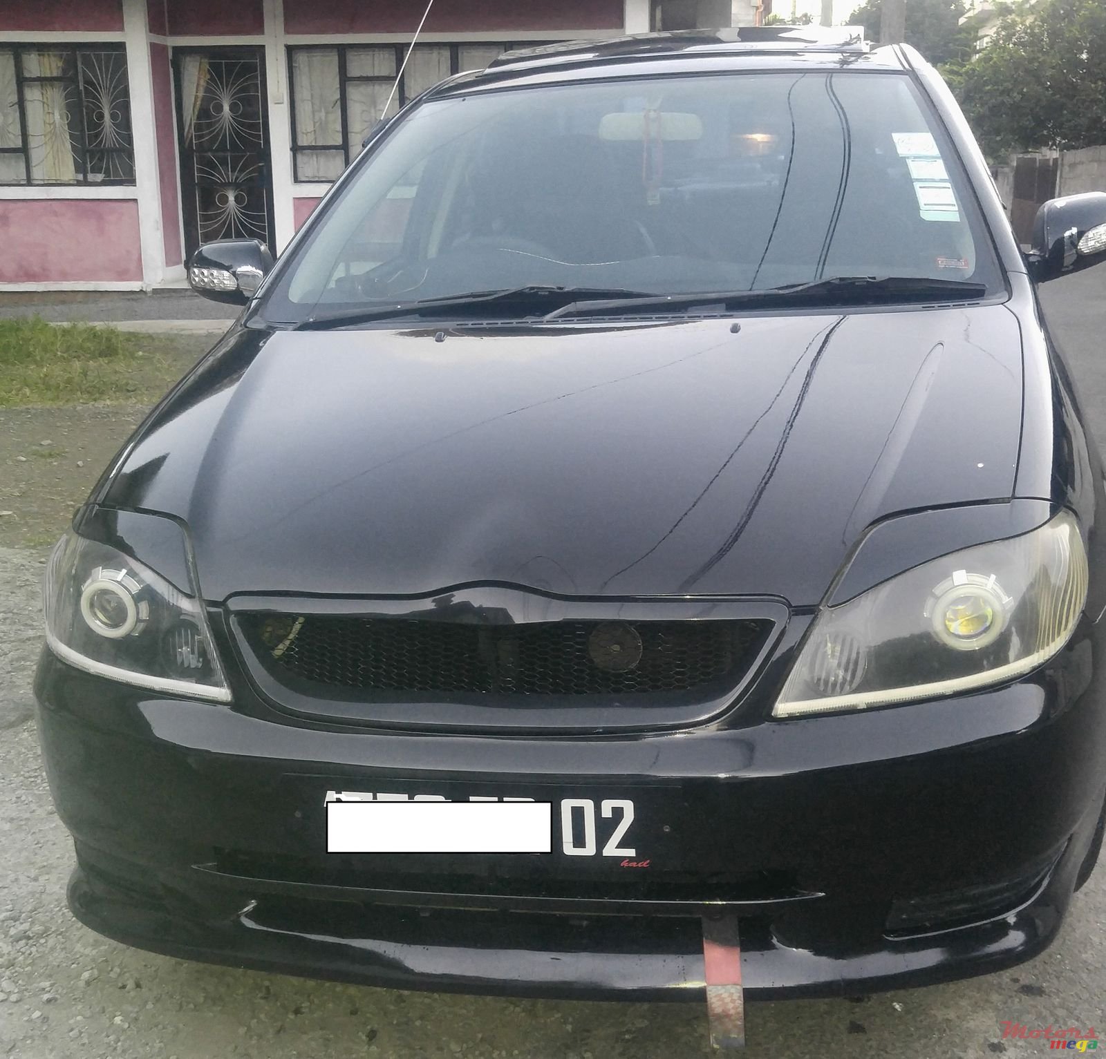 2002' Toyota Corolla NZE photo #1