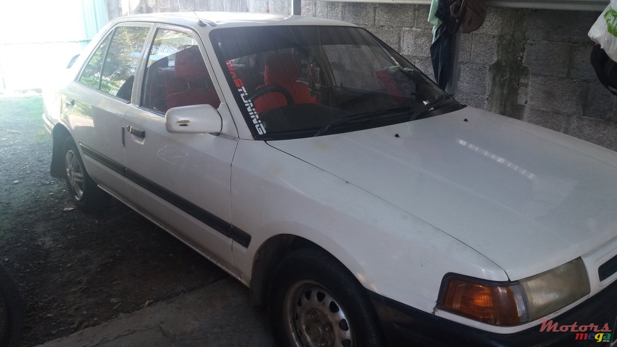1996' Mazda 323 photo #1