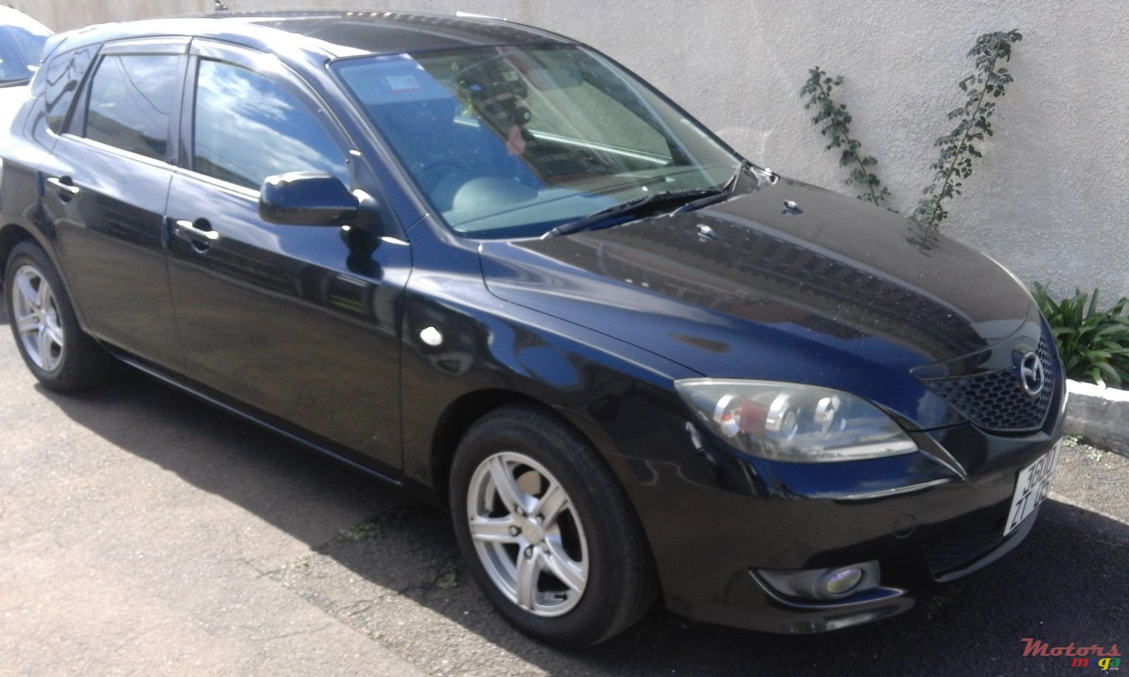 2005' Mazda Axela photo #1