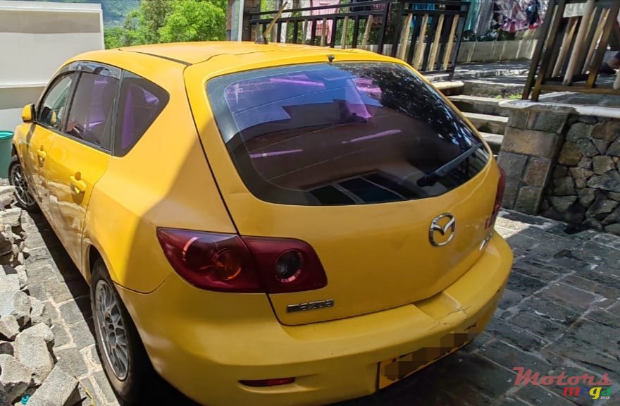 2004' Mazda 3 photo #2