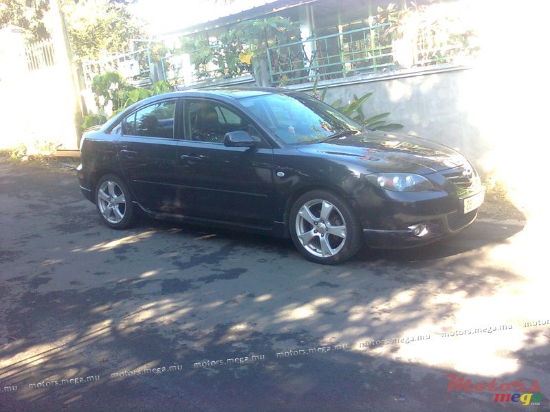 2004' Mazda 3 photo #1