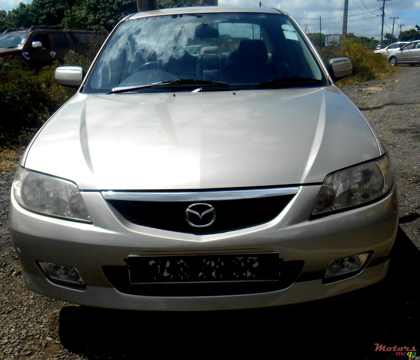2002' Mazda saloon photo #3