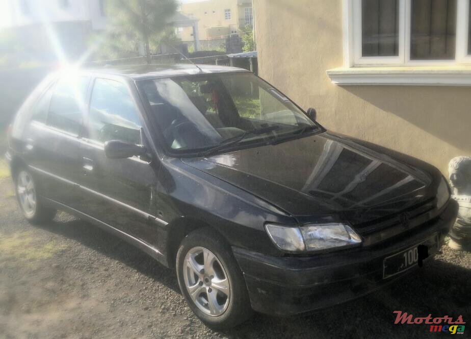 1994' Peugeot 306 Capurator 106 photo #1