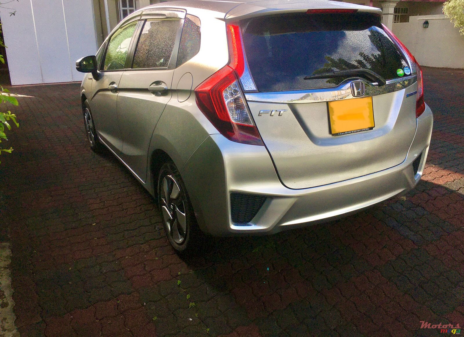 2014' Honda Fit Hybrid photo #1