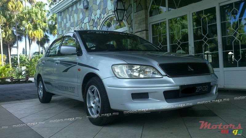2002' Mitsubishi CEDIA photo #2