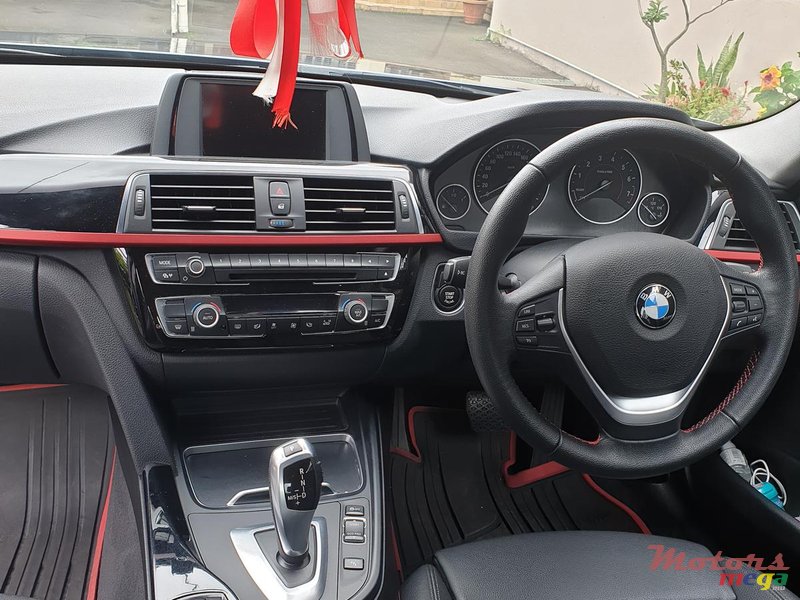 2016' BMW 318 photo #4