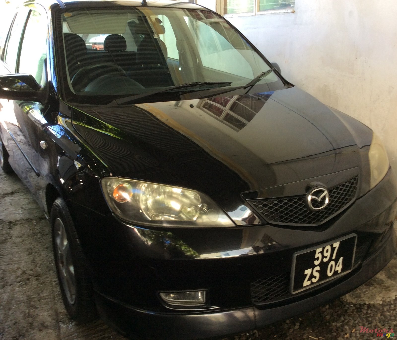 2004' Mazda 2 photo #1