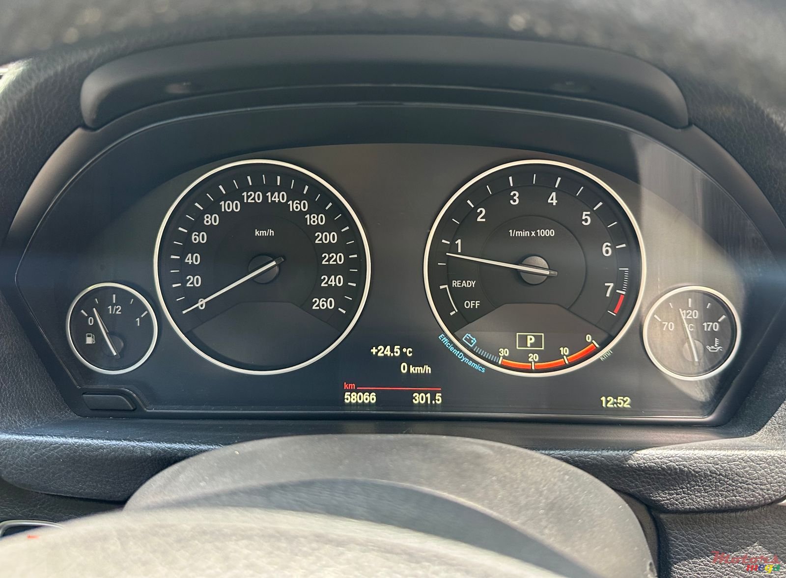 2015' BMW 320i photo #7