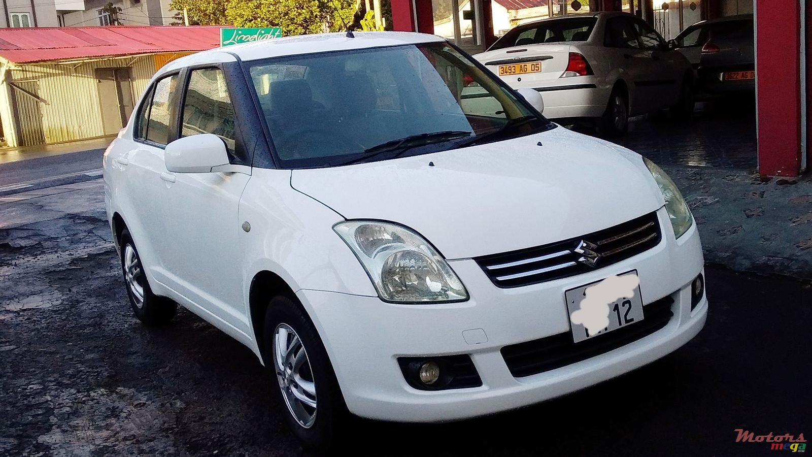 2012' Suzuki Swift Dsire photo #2