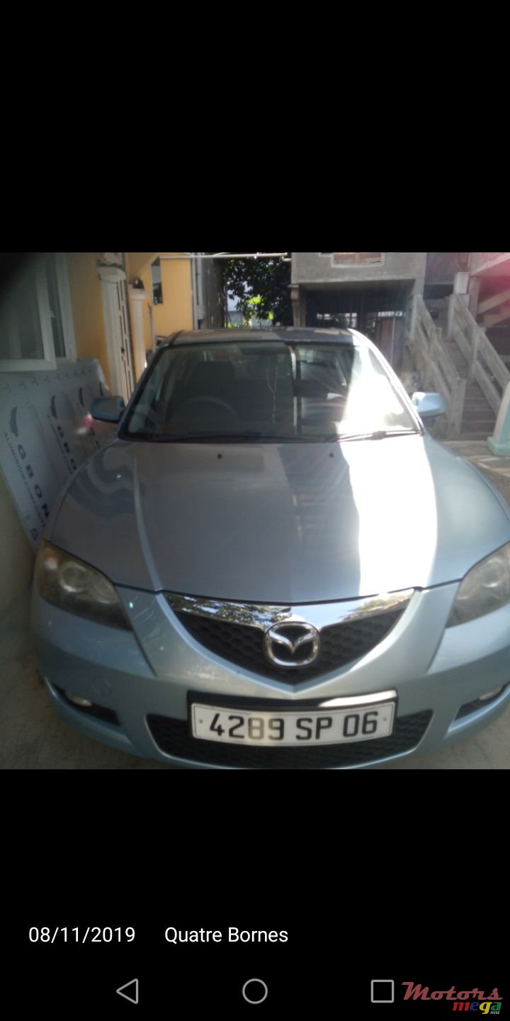 2006' Mazda 3 photo #3