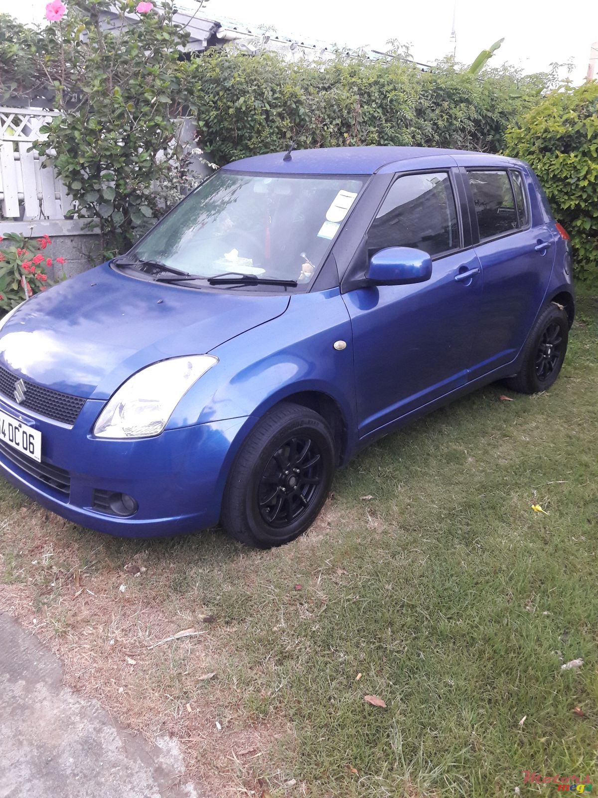2006' Suzuki Swift photo #2