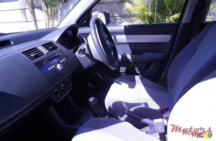 2012' Suzuki Swift Sedan photo #5