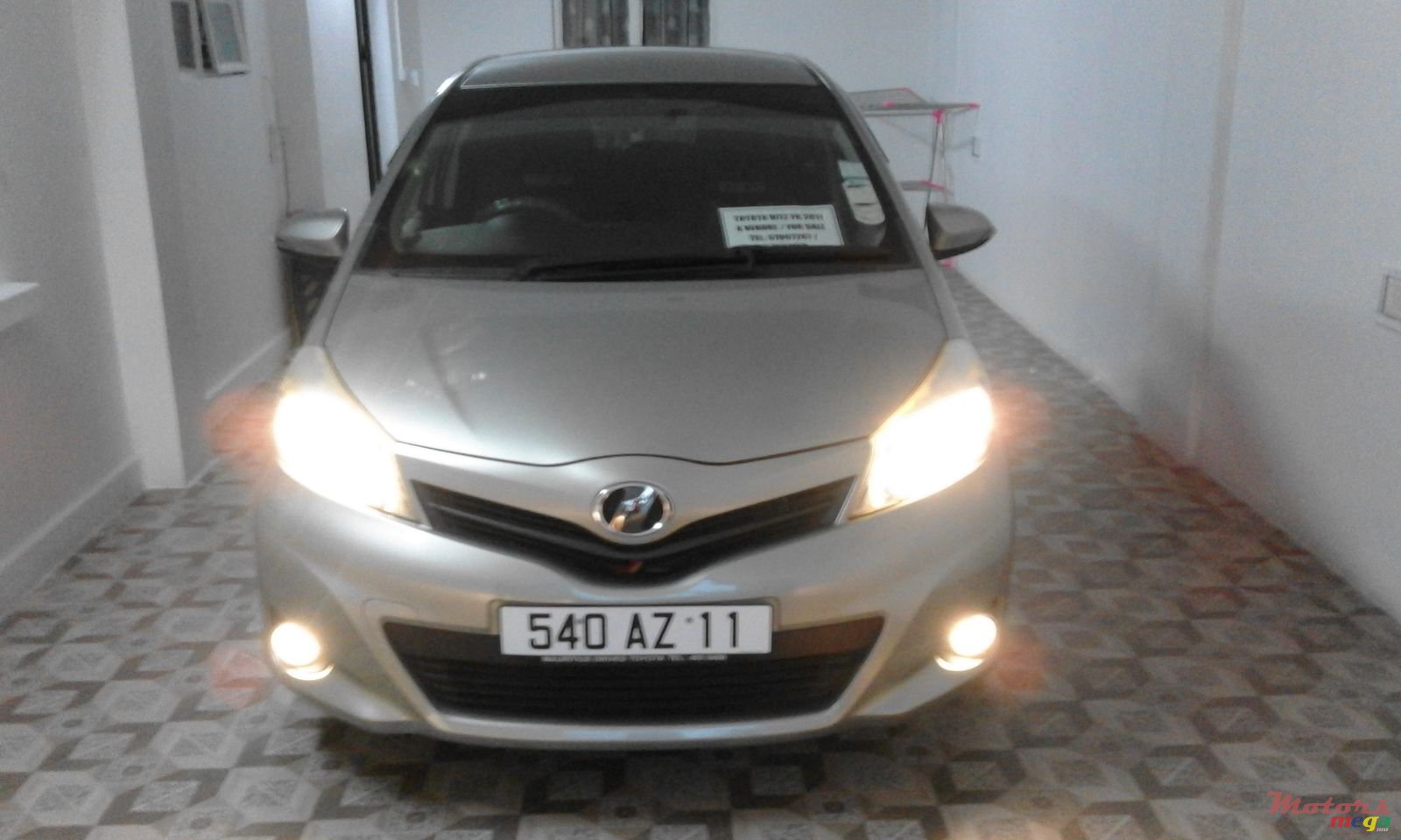 2011' Toyota Vitz photo #1