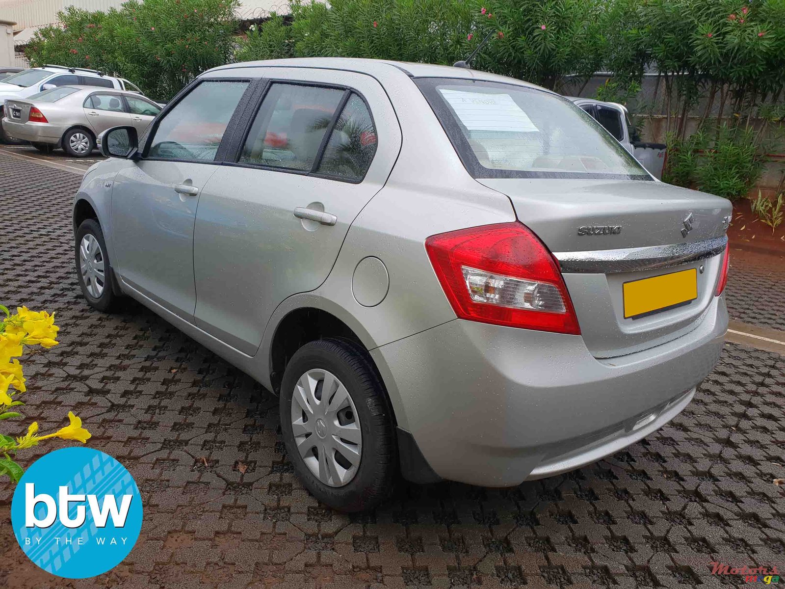 2014' Suzuki Swift Dzire photo #2