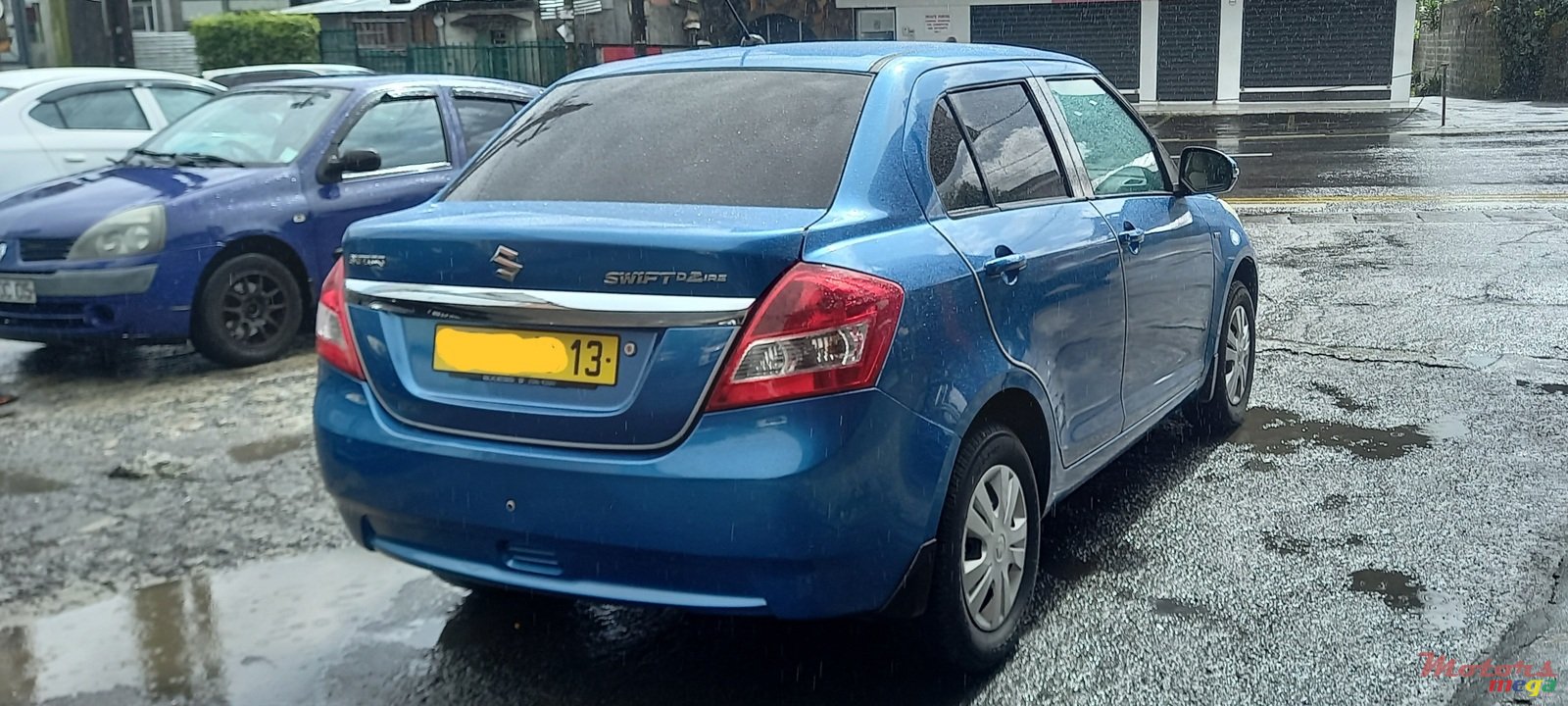 2013' Suzuki Swift Dsire photo #3