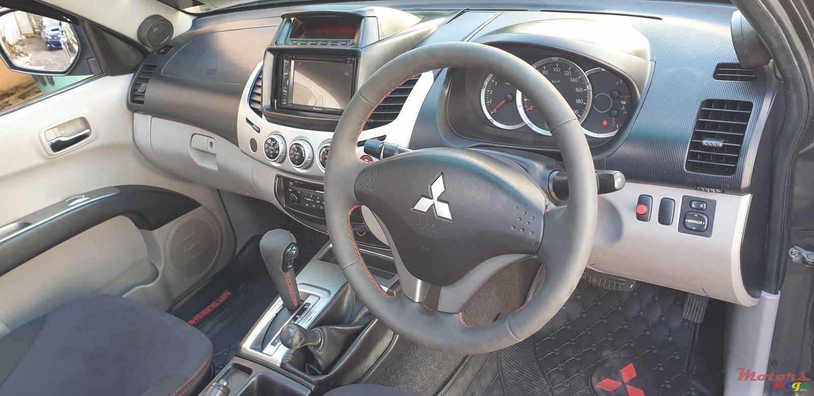 2011' Mitsubishi L200 Sportero photo #6