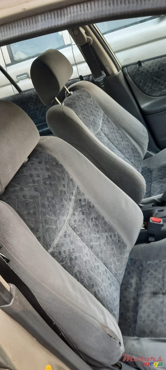 1999' Mazda 323 photo #7