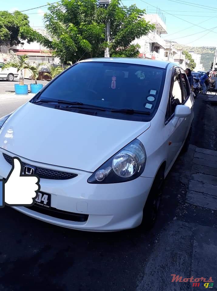 2004' Honda Fit Tinted windows, alloy tires photo #4