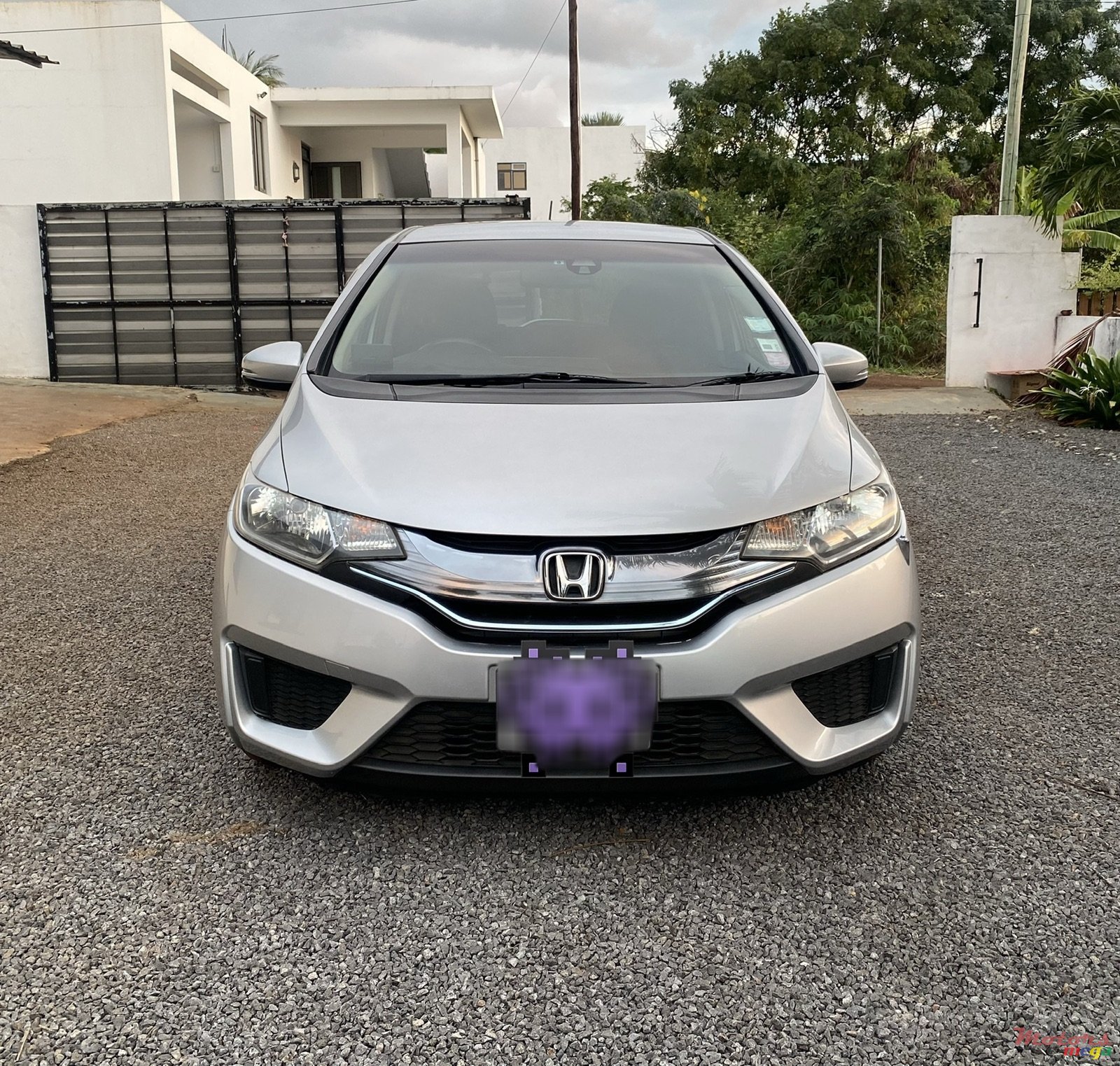 2014' Honda Fit Hybrid photo #1