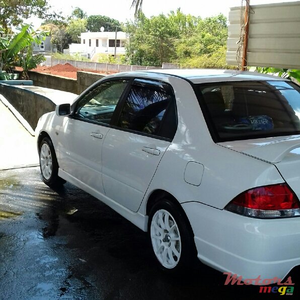 2004' Mitsubishi Lancer X photo #1