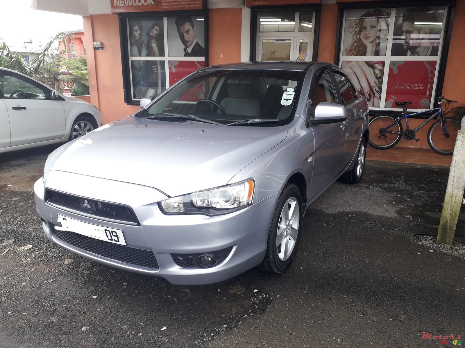 2009' Mitsubishi Lancer EX automatic photo #1