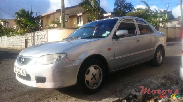 2004' Mazda 323 photo #1