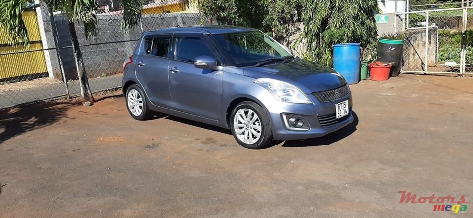 2014' Suzuki Swift photo #1