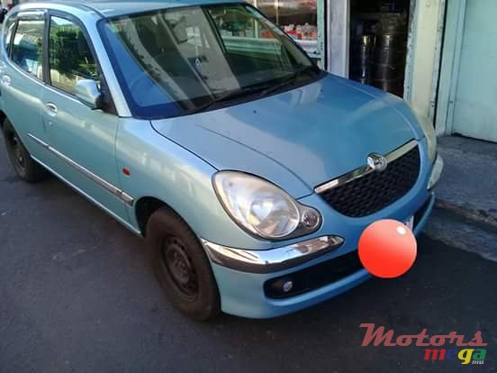2002' Toyota duet photo #5