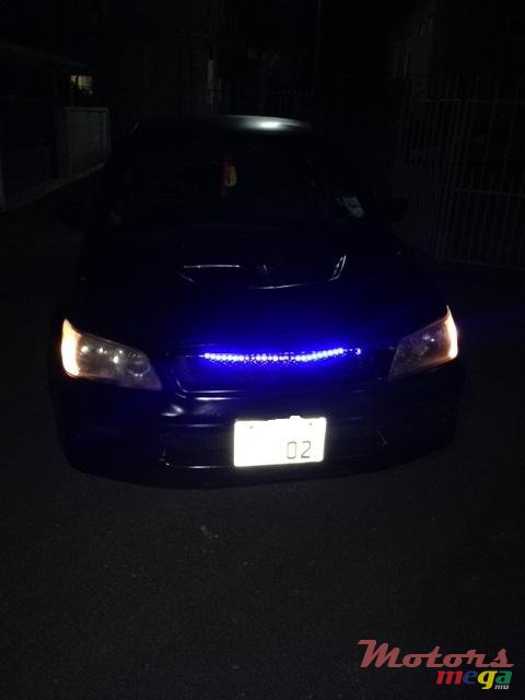 2002' Mitsubishi Lancer photo #2