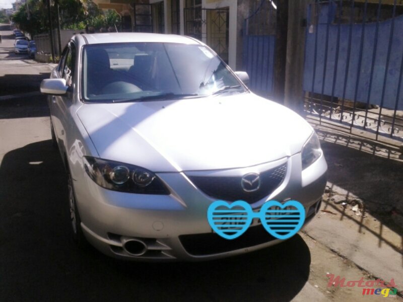 2003' Mazda 3 photo #1