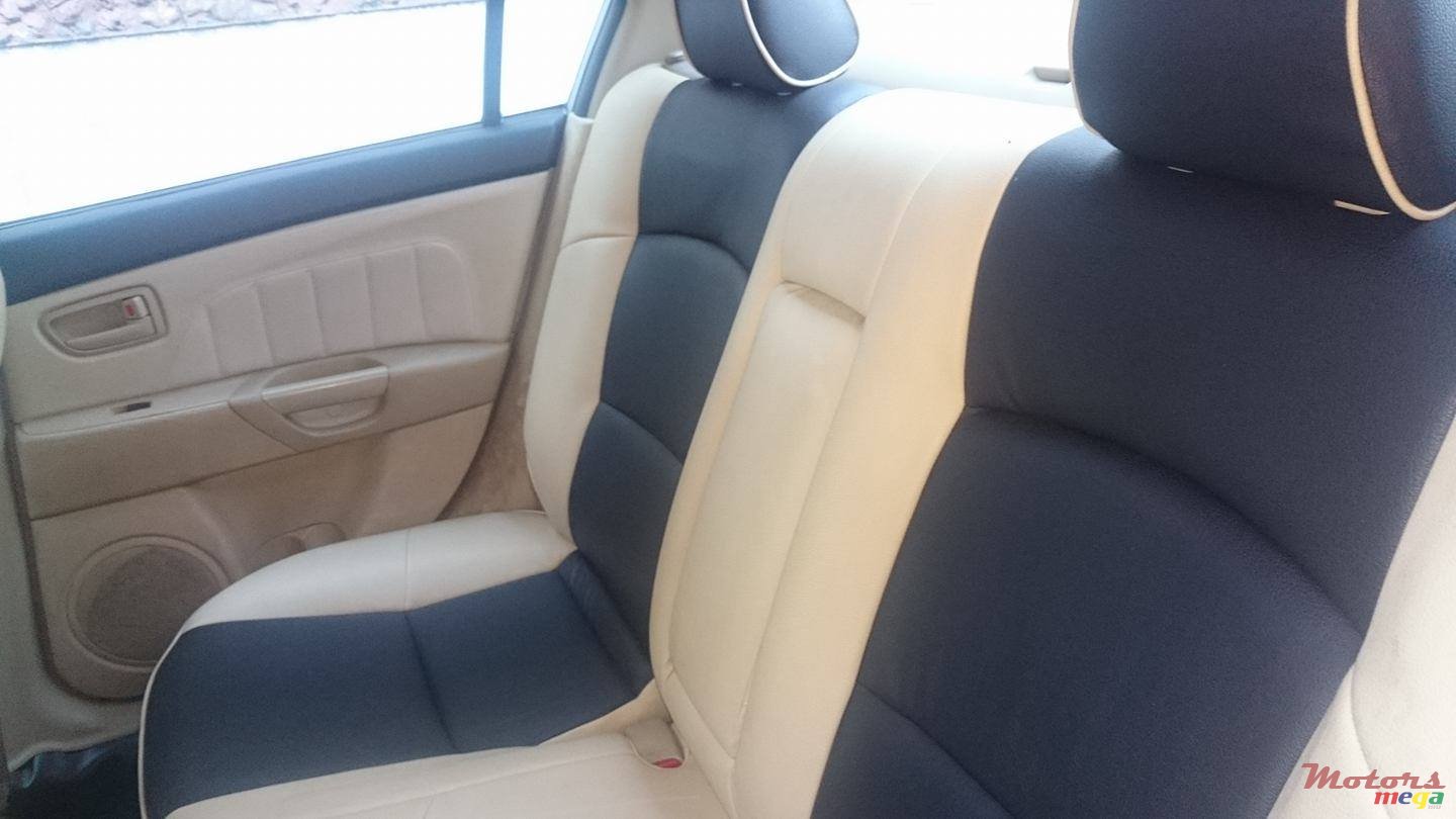 2004' Mazda 3 photo #7