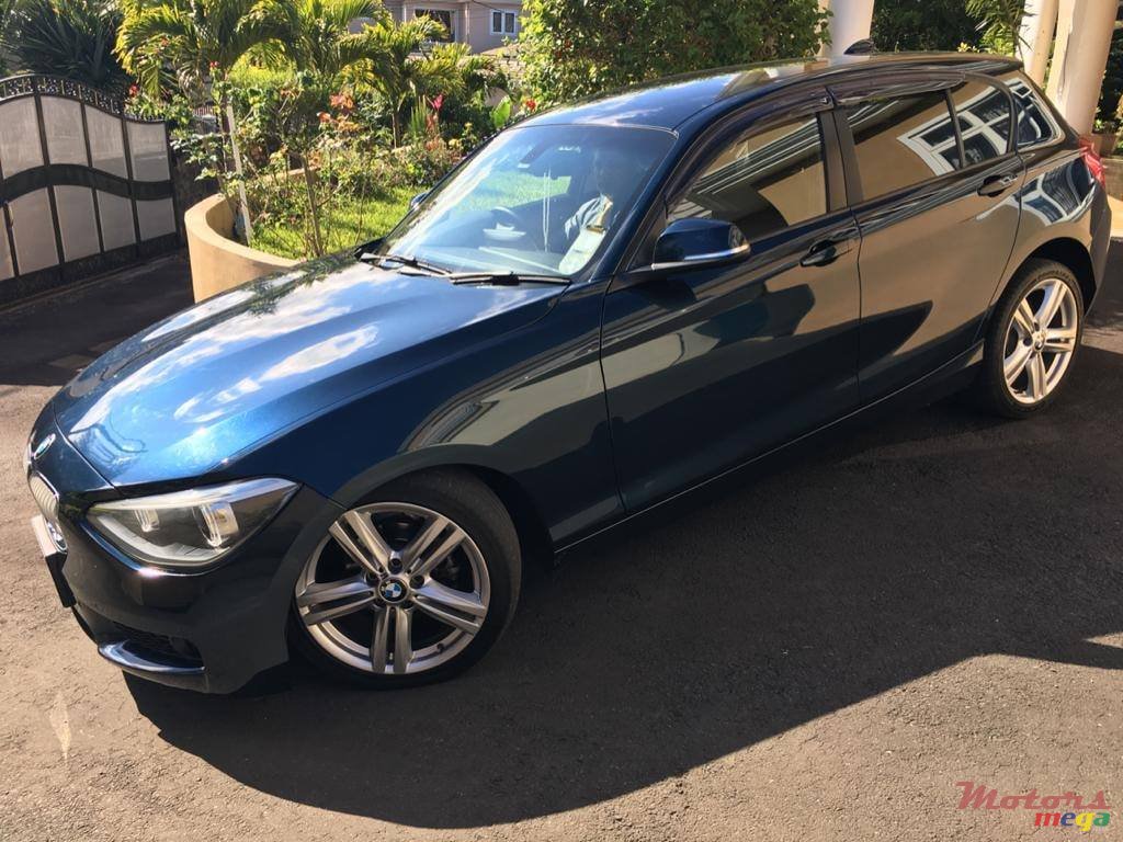 2012' BMW 116 photo #7