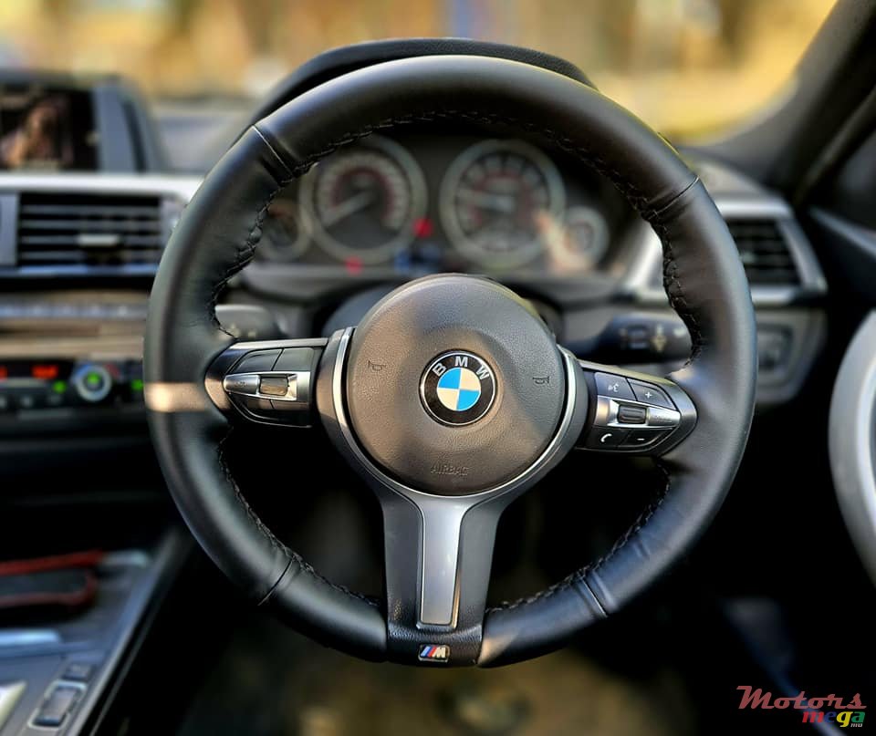 2015' BMW 316 photo #6