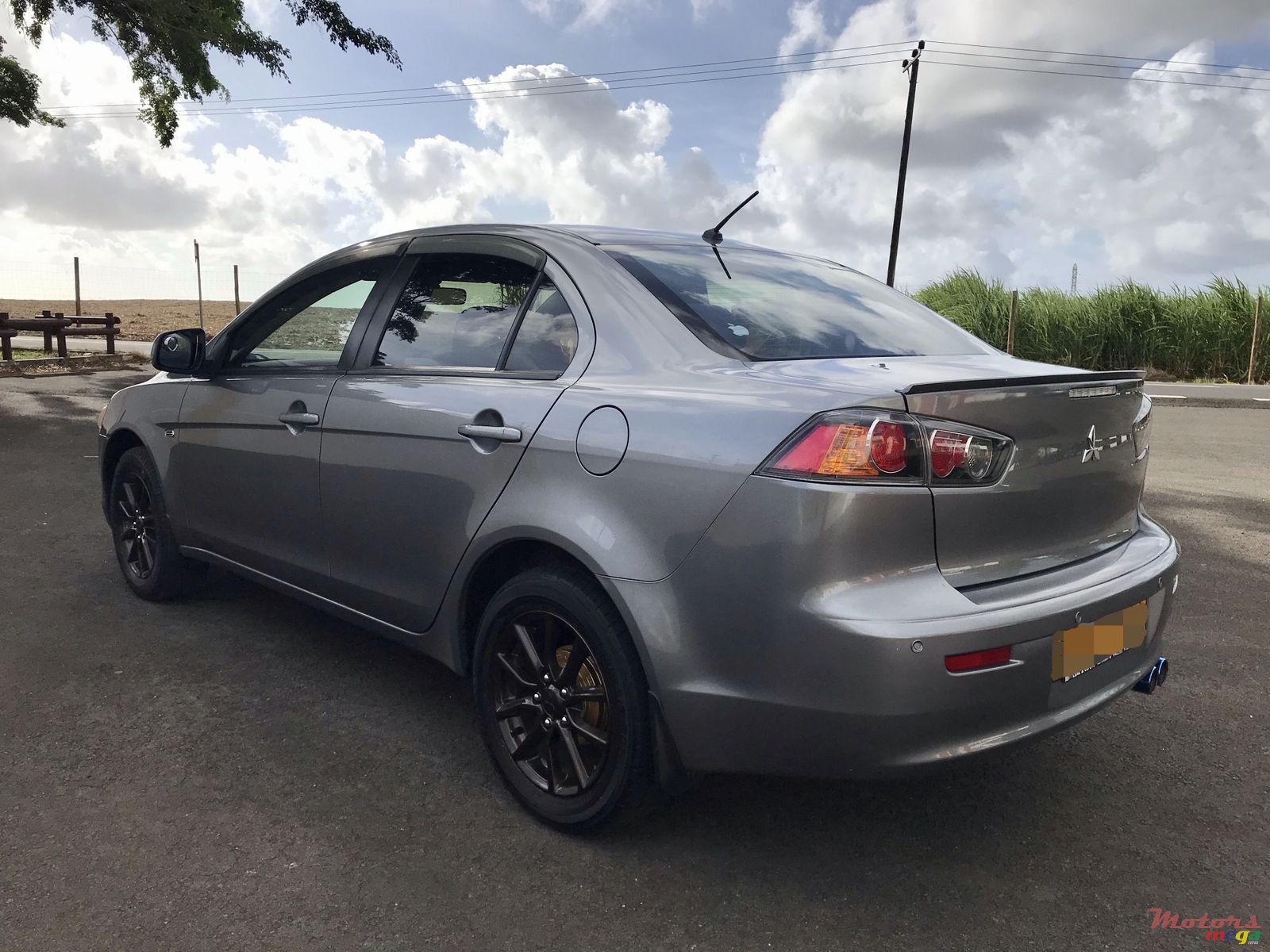 2014' Mitsubishi Lancer photo #4