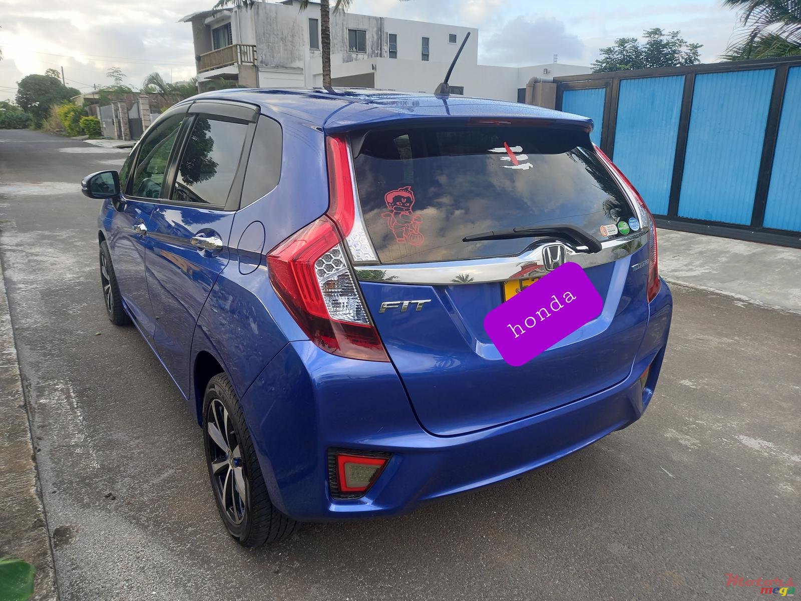 2015' Honda Fit Hybrid photo #1