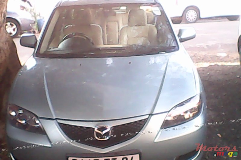 2004' Mazda 3 photo #1