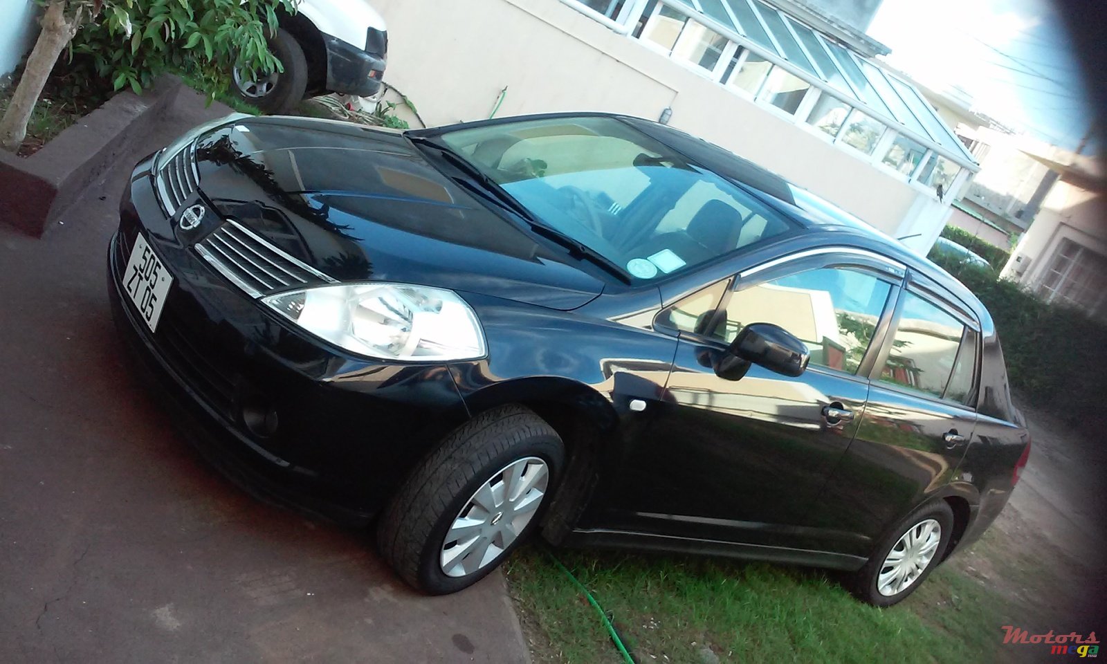 2005' Nissan Tiida Tiida sedan photo #1