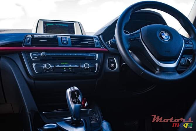 2014' BMW 320 photo #1