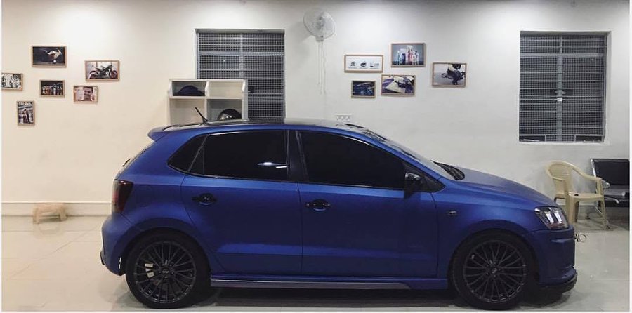 VW Polo with sports body kit and matte blue wrap