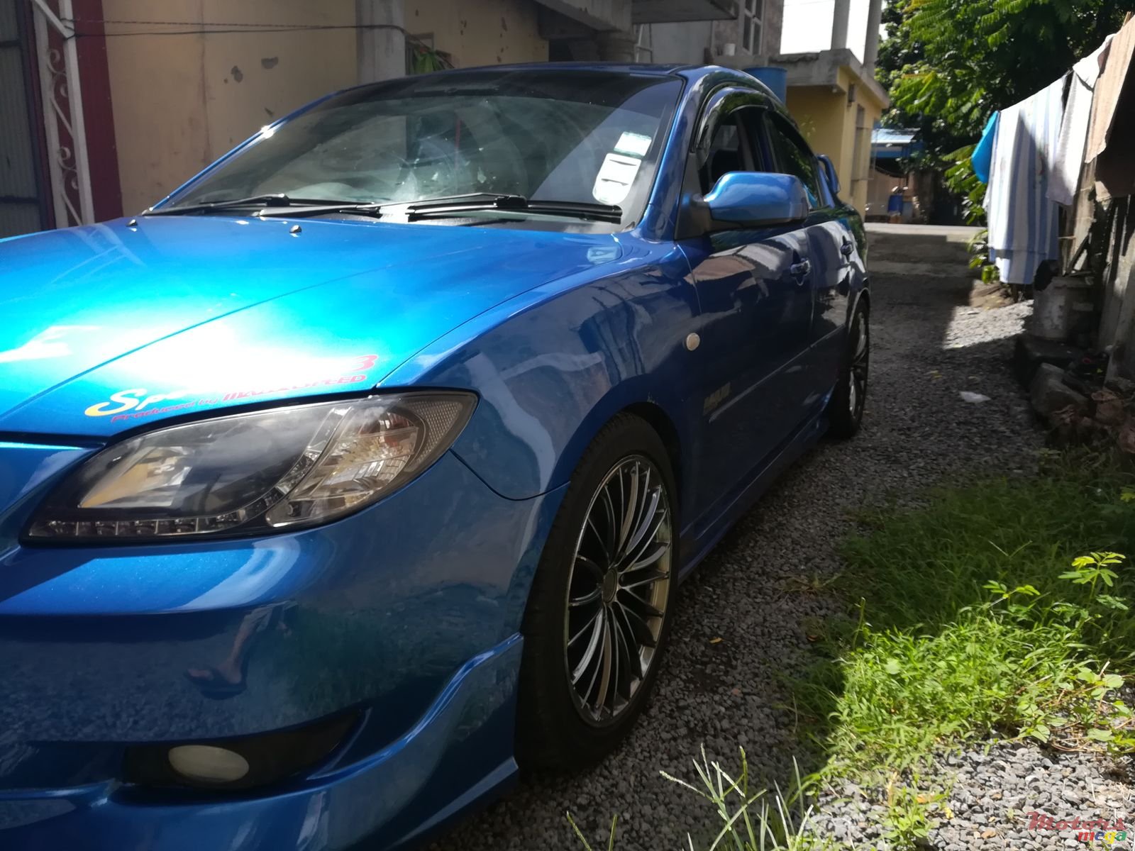 2004' Mazda 3 photo #1