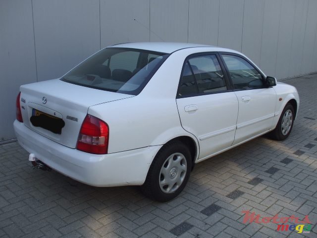 2003' Mazda 323 photo #1