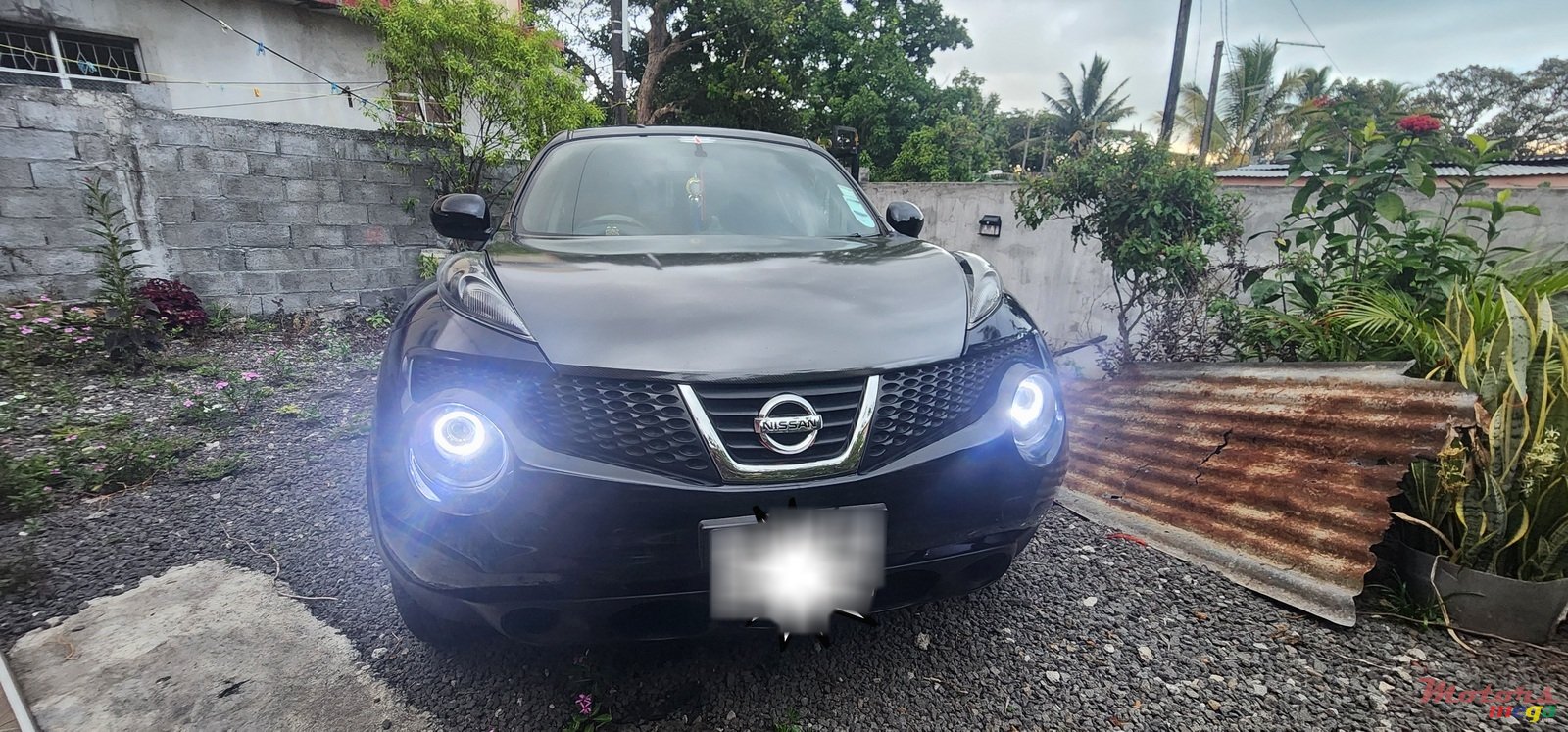 2010' Nissan Juke Headlight blackhousing photo #7